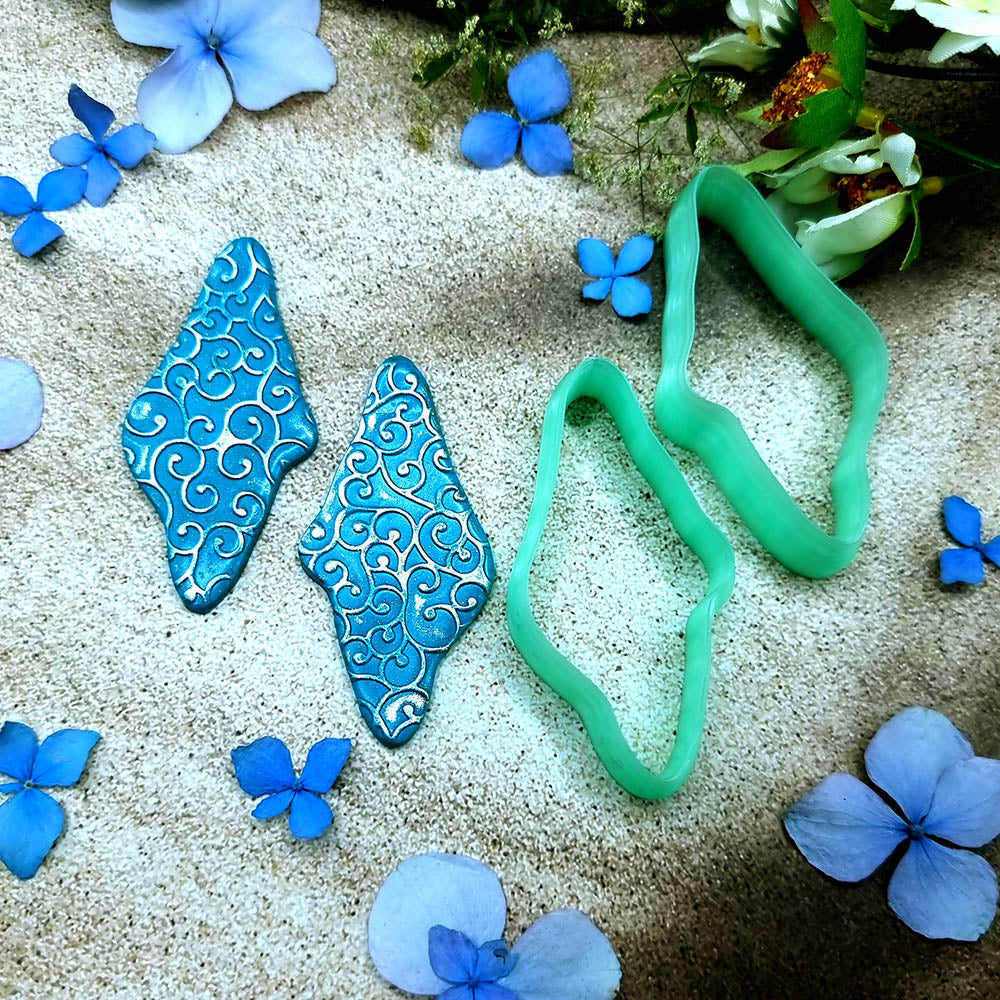 Pair of mirrored green PLA wavy pebble polymer clay cutters, a left and a right cutter, for long statement earrings by SweetyBijou