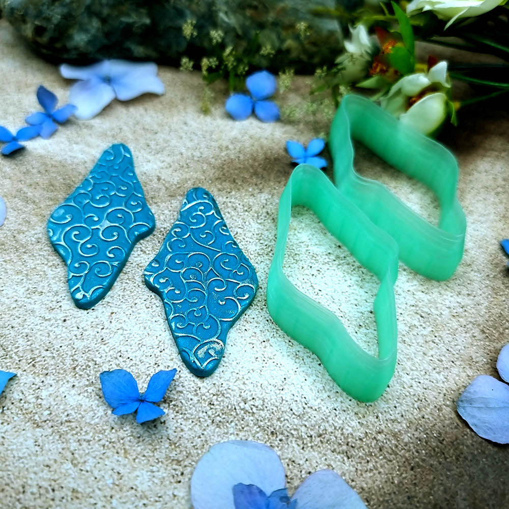 Pair of mirrored green PLA wavy pebble polymer clay cutters, a left and a right cutter, for long statement earrings by SweetyBijou