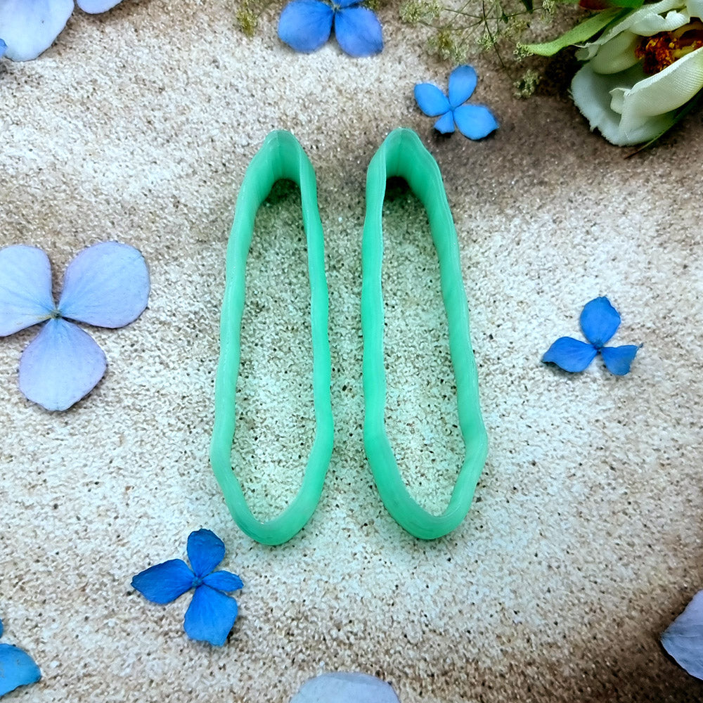 Pair of mirrored green PLA slim petal polymer clay cutters, a left and a right cutter, for long statement earrings by SweetyBijou