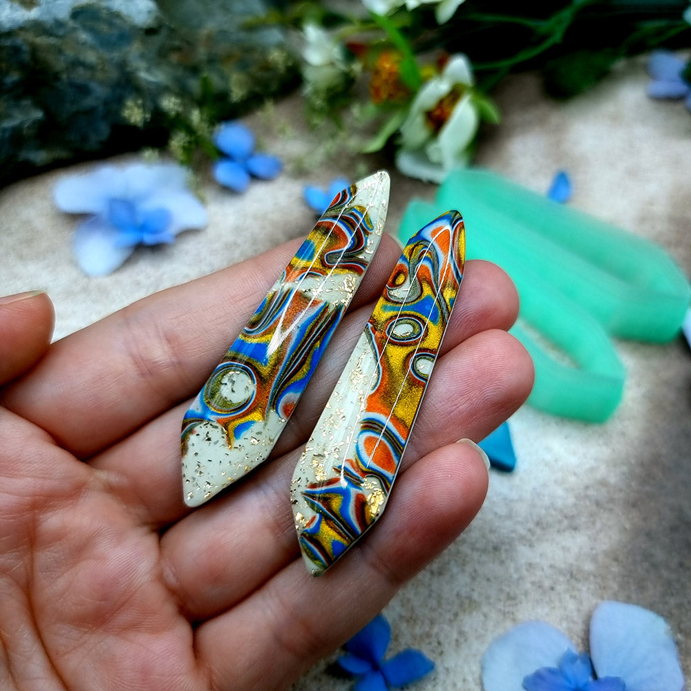 Pair of mirrored green PLA chisel quill polymer clay cutters, a left and a right cutter, for long statement earrings by SweetyBijou