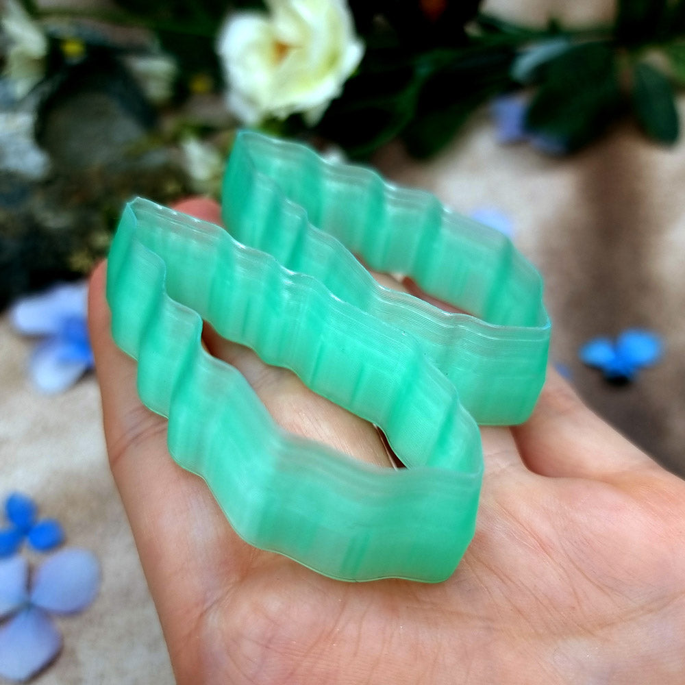 Pair of mirrored green PLA scalloped leaf polymer clay cutters, a left and a right cutter, for long statement earrings by SweetyBijou