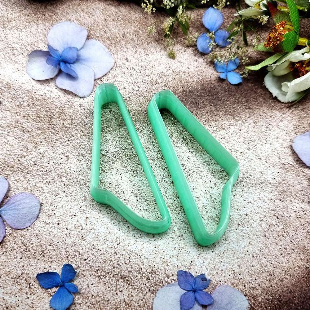 Pair of mirrored green PLA swoosh wing polymer clay cutters, a left and a right cutter, for long statement earrings by SweetyBijou