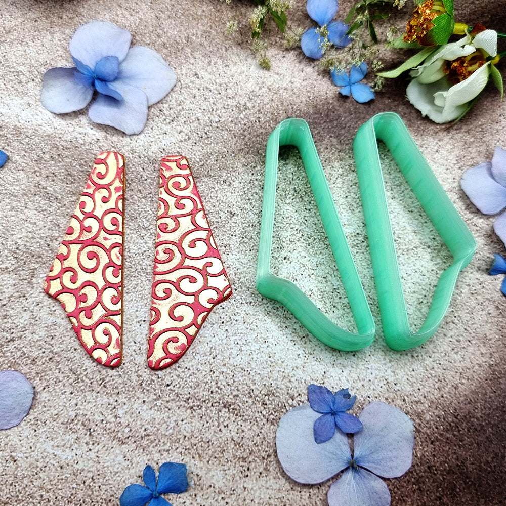Pair of mirrored green PLA swoosh wing polymer clay cutters, a left and a right cutter, for long statement earrings by SweetyBijou