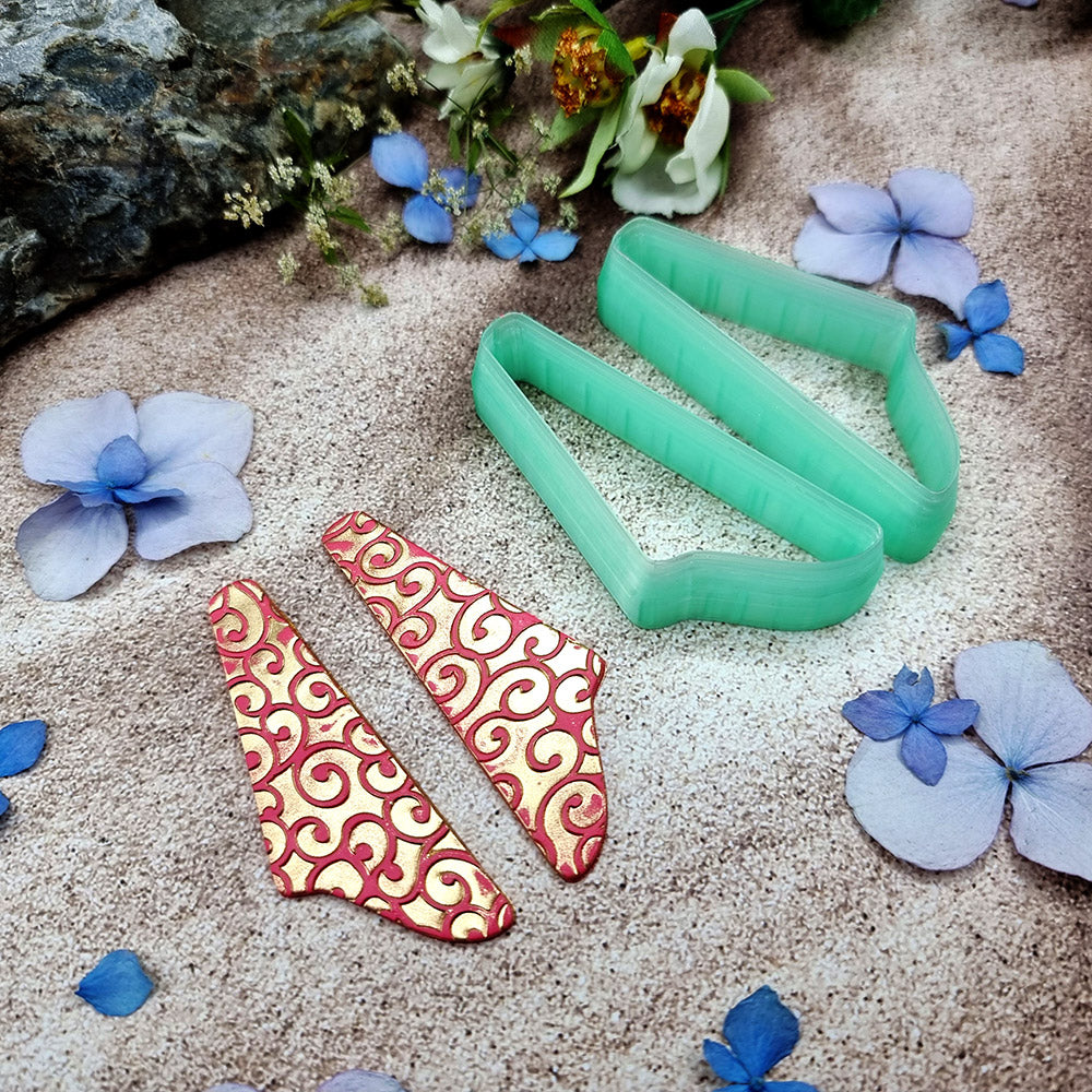 Pair of mirrored green PLA swoosh wing polymer clay cutters, a left and a right cutter, for long statement earrings by SweetyBijou