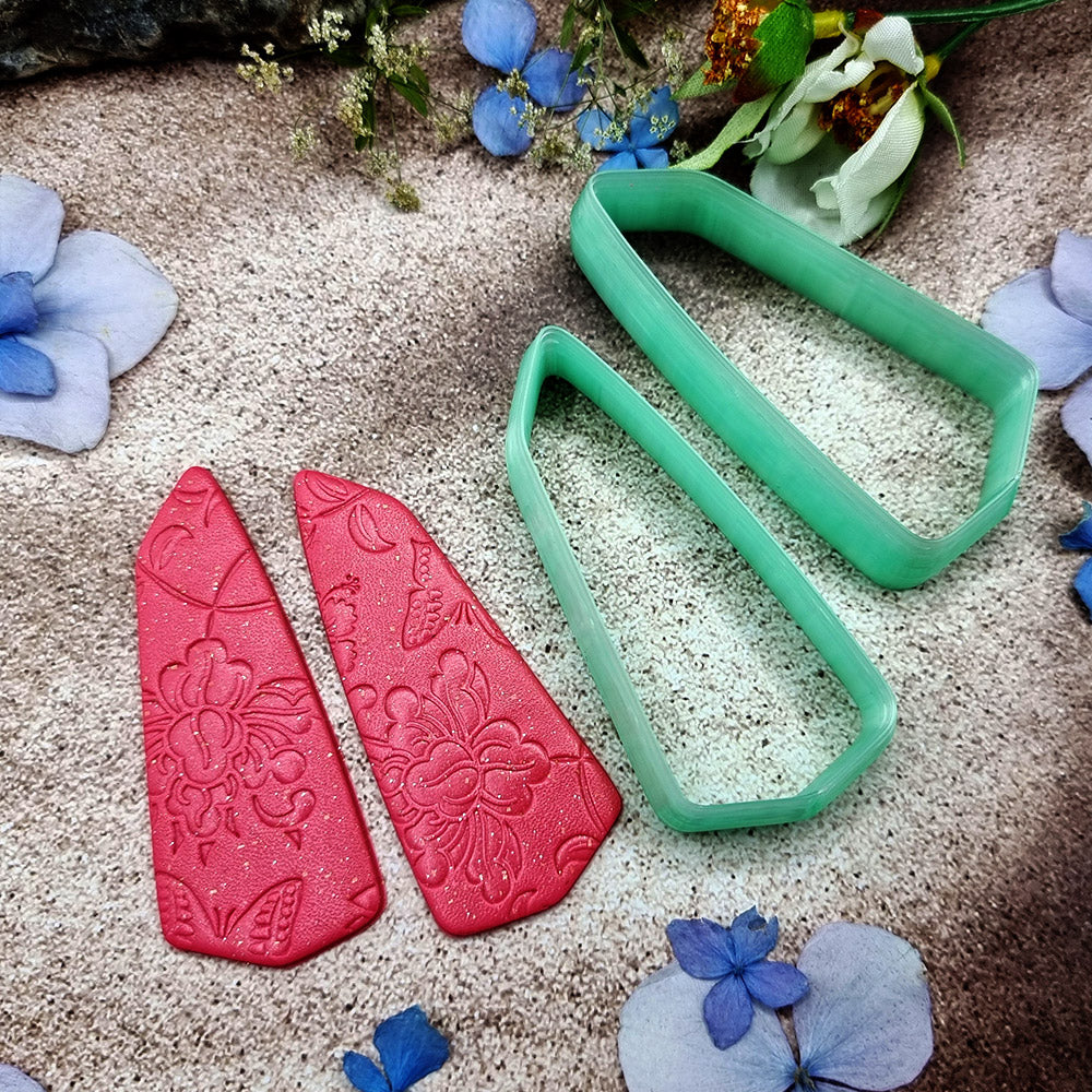 Pair of mirrored green PLA broad wedge polymer clay cutters, a left and a right cutter, for long statement earrings by SweetyBijou
