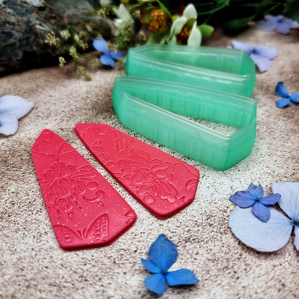 Pair of mirrored green PLA broad wedge polymer clay cutters, a left and a right cutter, for long statement earrings by SweetyBijou