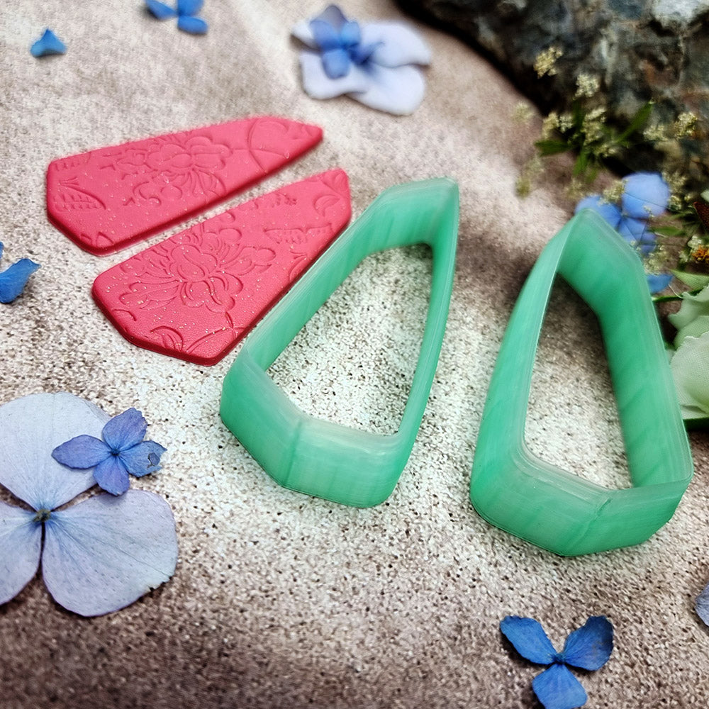 Pair of mirrored green PLA broad wedge polymer clay cutters, a left and a right cutter, for long statement earrings by SweetyBijou
