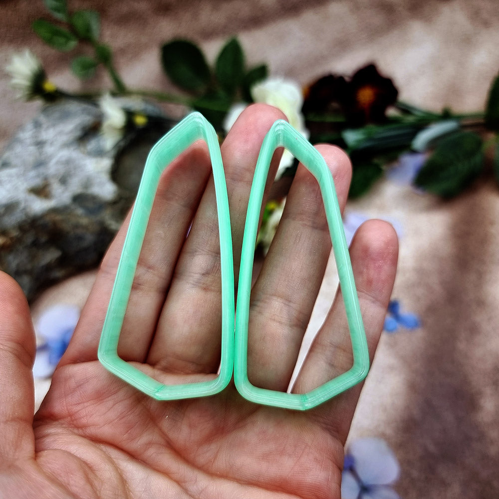 Pair of mirrored green PLA broad wedge polymer clay cutters, a left and a right cutter, for long statement earrings by SweetyBijou