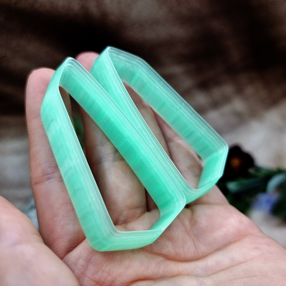Pair of mirrored green PLA broad wedge polymer clay cutters, a left and a right cutter, for long statement earrings by SweetyBijou