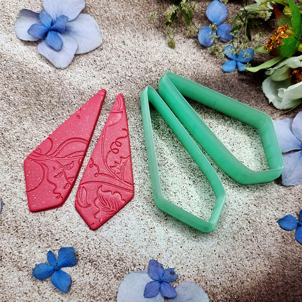 Pair of mirrored green PLA crystal kite polymer clay cutters, a left and a right cutter, for long statement earrings by SweetyBijou