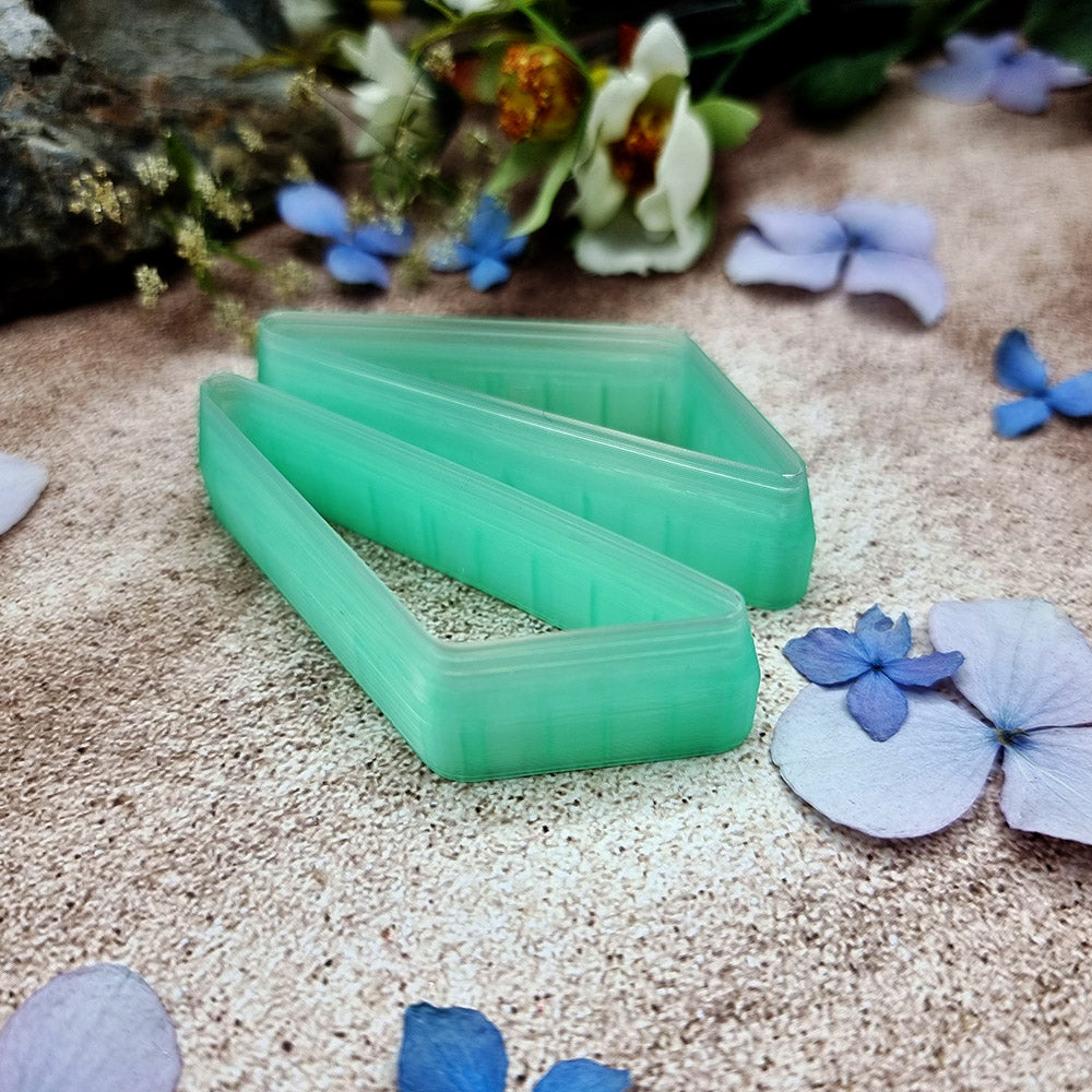 Pair of mirrored green PLA slanted triangle polymer clay cutters, a left and a right cutter, for long statement earrings by SweetyBijou