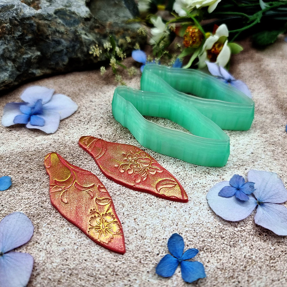 Pair of mirrored green PLA wavy marquise polymer clay cutters, a left and a right cutter, for long statement earrings by SweetyBijou