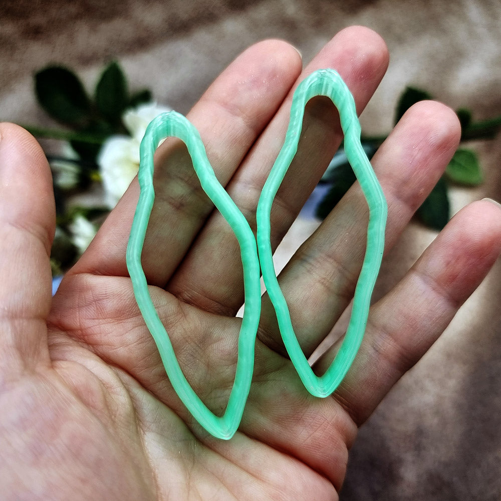Pair of mirrored green PLA wavy marquise polymer clay cutters, a left and a right cutter, for long statement earrings by SweetyBijou