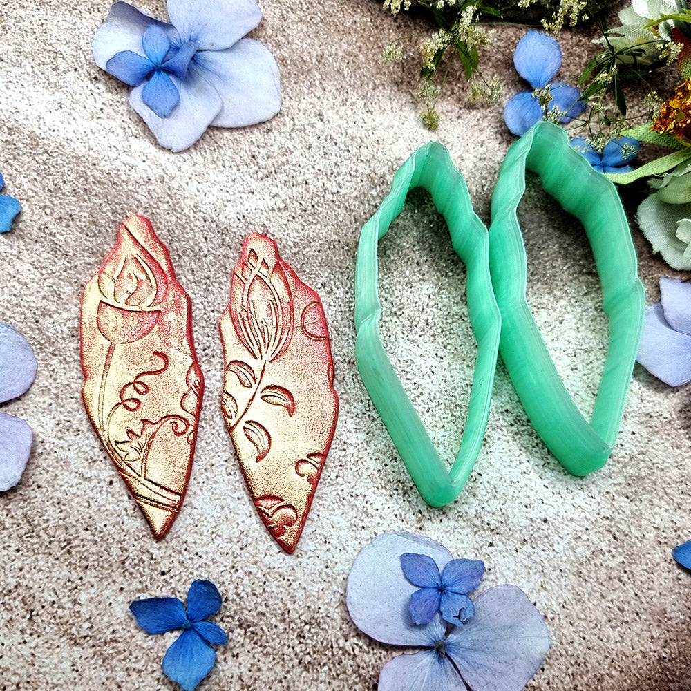 Pair of mirrored green PLA notched marquise polymer clay cutters, a left and a right cutter, for long statement earrings by SweetyBijou