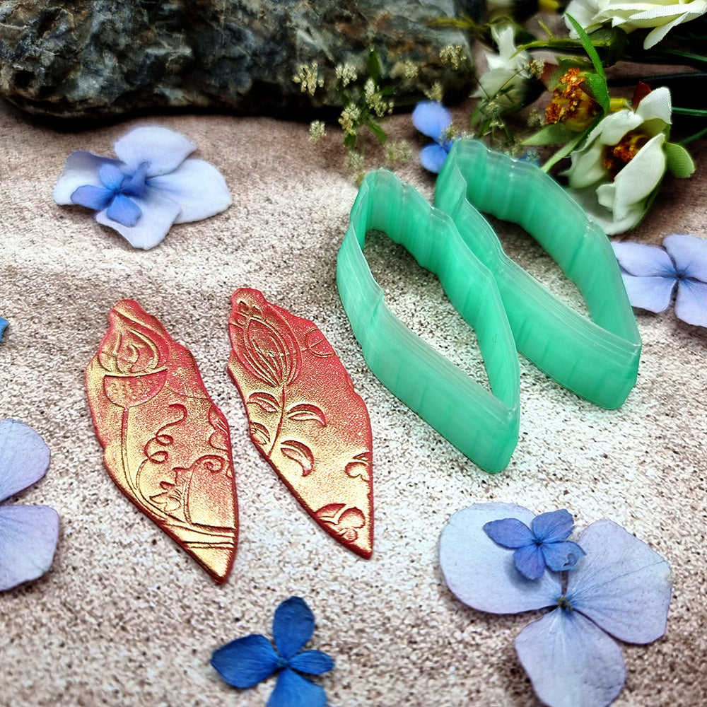 Pair of mirrored green PLA notched marquise polymer clay cutters, a left and a right cutter, for long statement earrings by SweetyBijou