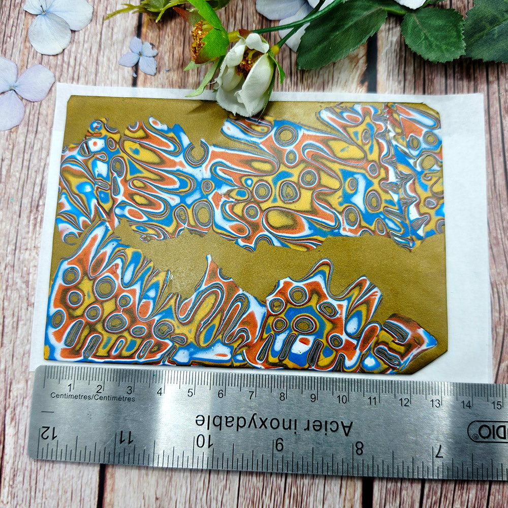 Raw polymer clay veneer sheet, Golden Reef Mokume Gane