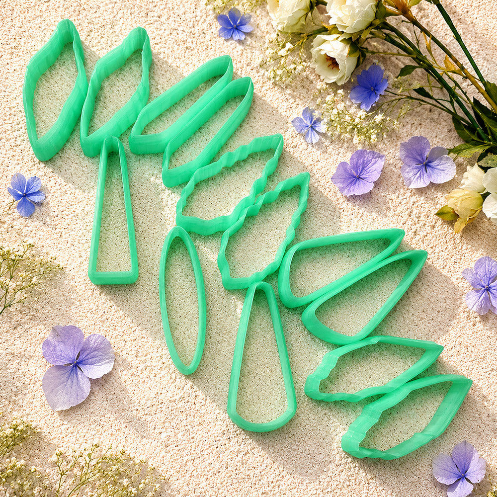 Bundle of green PLA long polymer clay cutters in leaf, teardrop, kite and bar shapes, all 6 cm long, for statement earrings by SweetyBijou