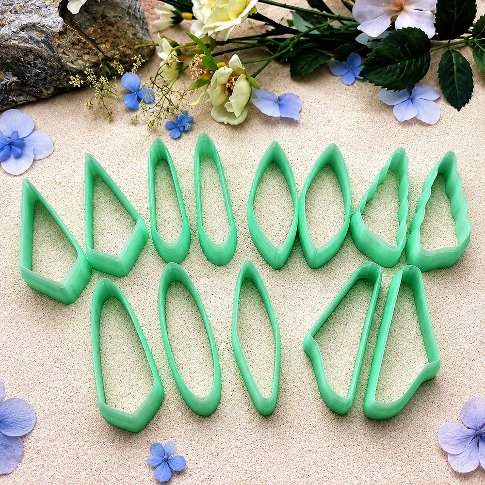 Bundle of green PLA long polymer clay cutters in mirrored leaf, wedge and bar shapes, all 6 cm long, for statement earrings by SweetyBijou
