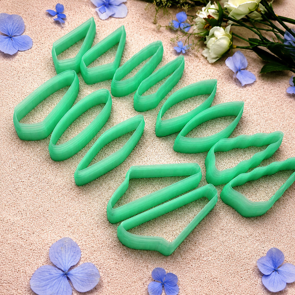 Bundle of green PLA long polymer clay cutters in mirrored leaf, wedge and bar shapes, all 6 cm long, for statement earrings by SweetyBijou