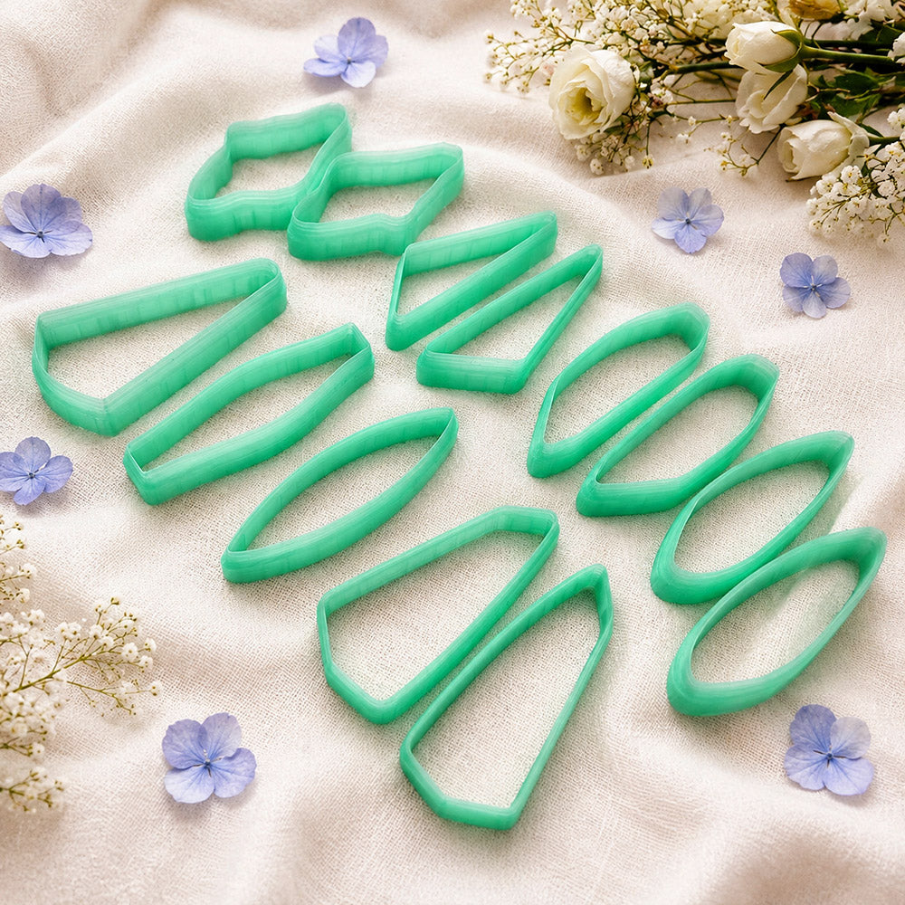 Bundle of green PLA long polymer clay cutters in slim marquise, oval and wedge shapes, all 6 cm long, for statement earrings by SweetyBijou