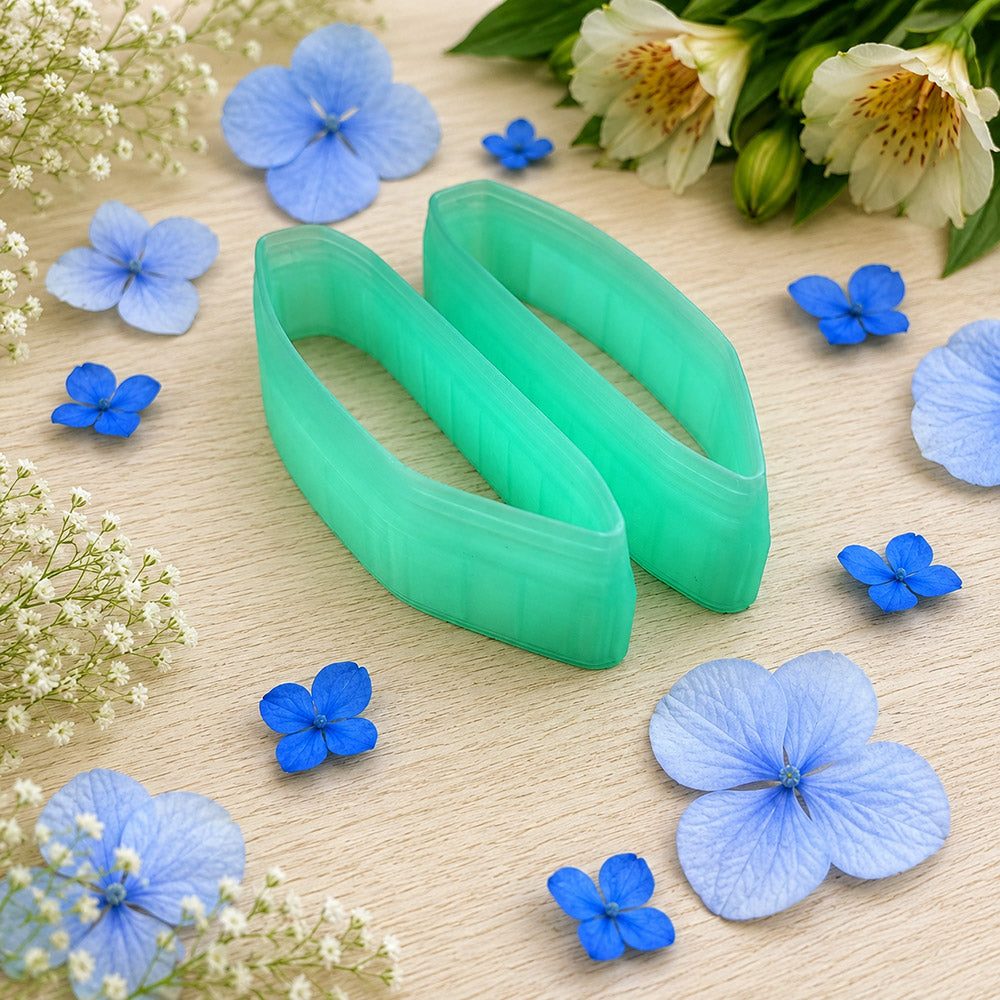 Pair of mirrored green PLA angled shard polymer clay cutters, a left and a right cutter, for long statement earrings by SweetyBijou