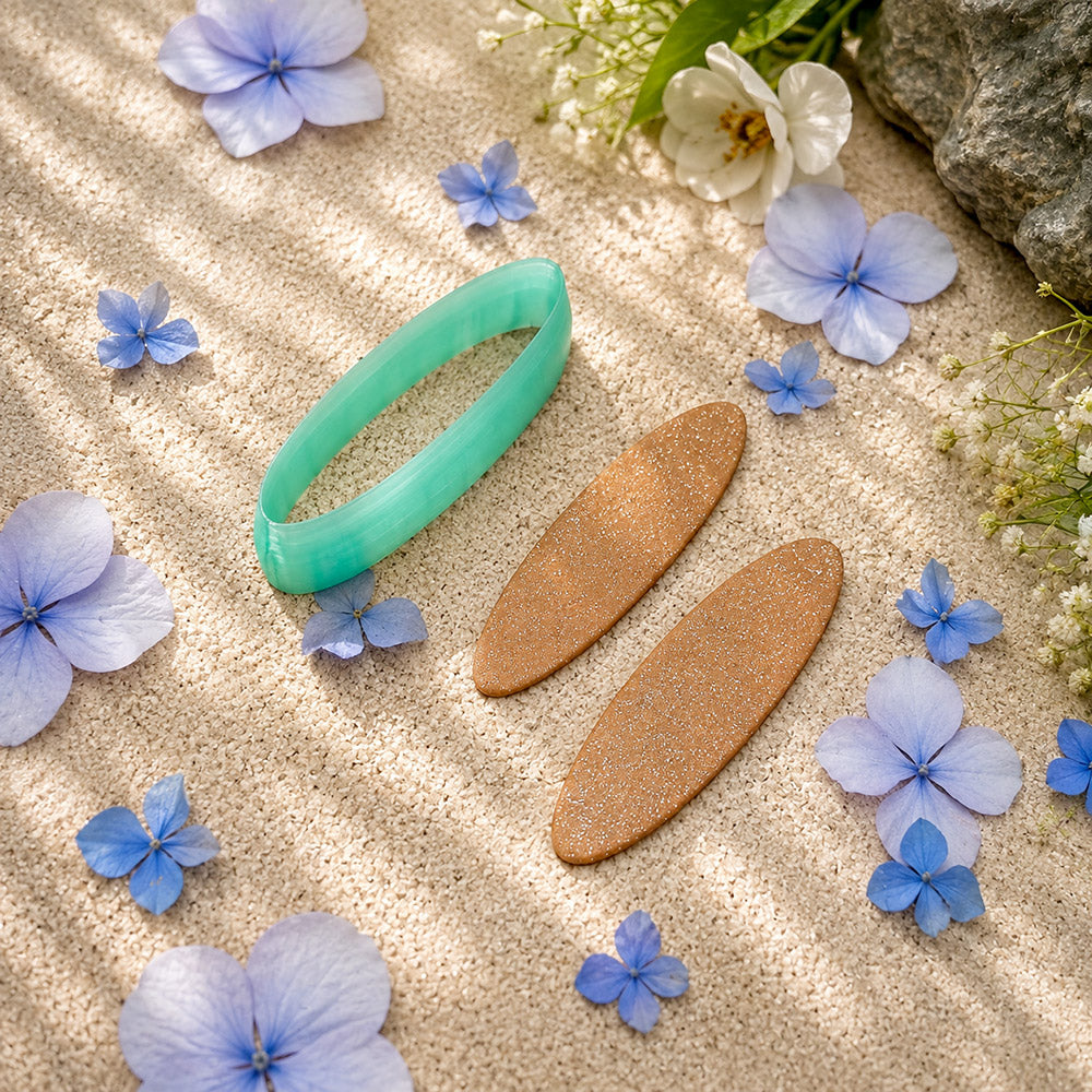 Green PLA long oval polymer clay cutter with smooth rounded ends and terracotta clay oval earring pieces by SweetyBijou