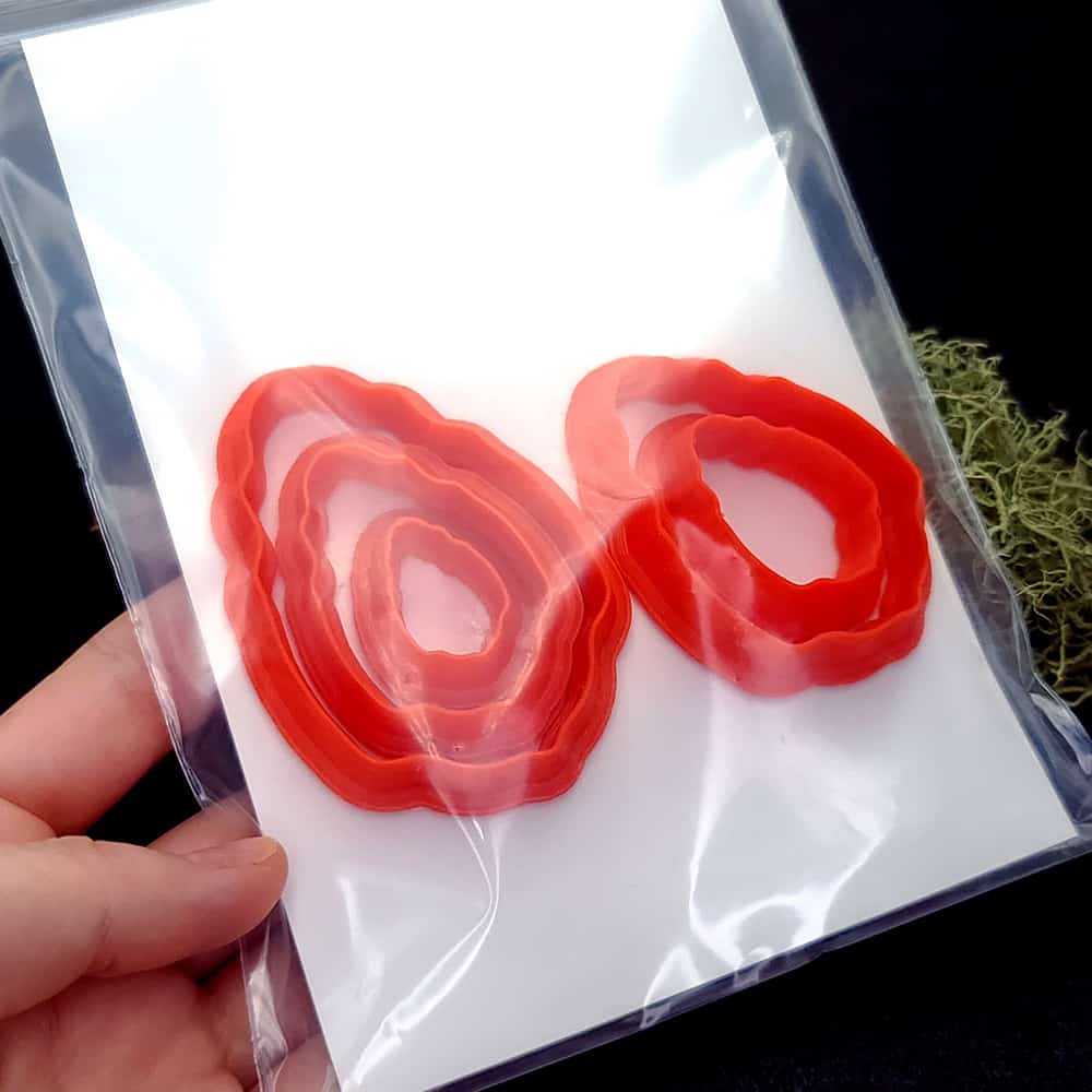 Wavy oval polymer clay cutter with organic softly rippled edge