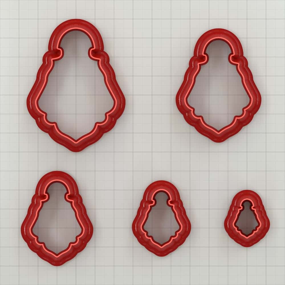 Vintage bell shape polymer clay cutter with curved body and wavy scalloped hem
