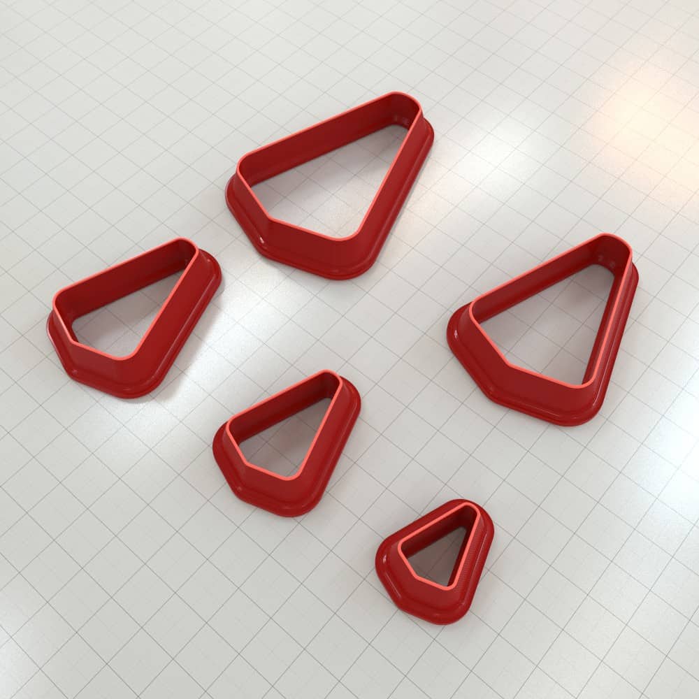 Rounded triangle polymer clay cutter with soft corners and apex at top