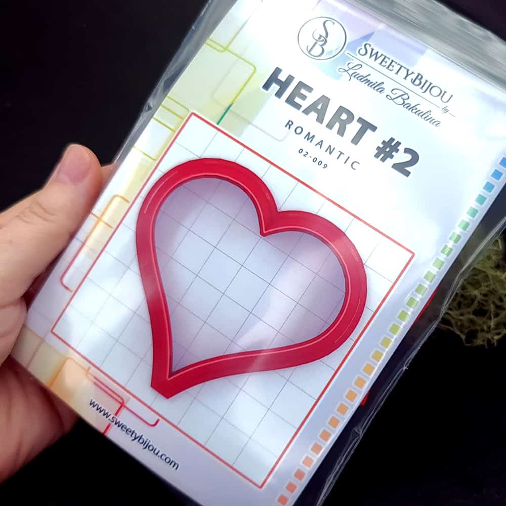 Folk style heart polymer clay cutter with softly pointed lobes